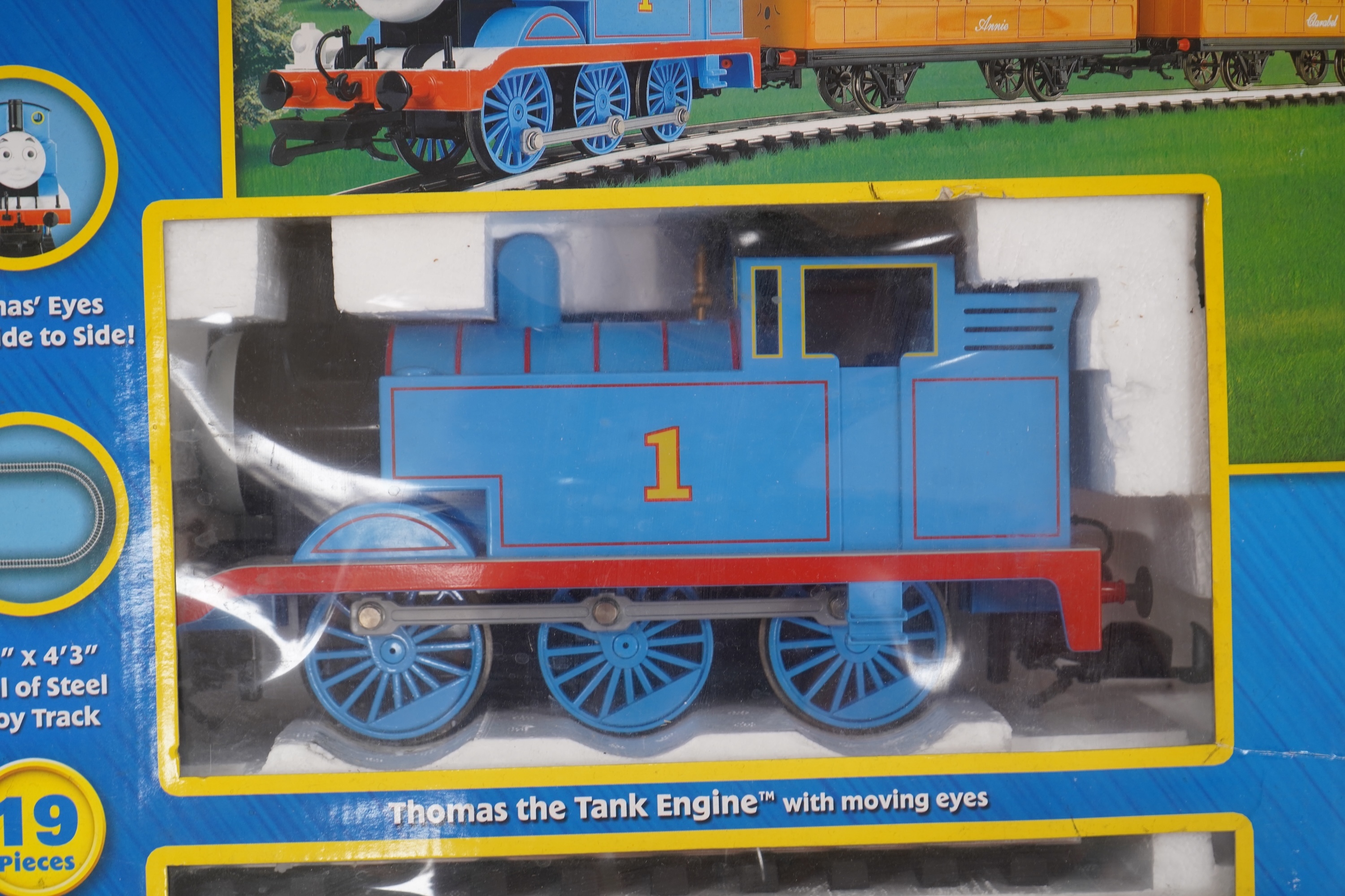 A boxed Bachmann G scale (45mm gauge) Thomas the Tank Engine train set (90068), comprising Thomas with the coaches Annie and Clarabel, track sections and controller. Condition - good, minor damage to the box.